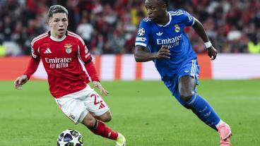 Benfica's Gianluca Prestianni (L) vies for the ball with Real Madrid's Vinicius Junior during the UEFA Champions League soccer match between Benfica and Real Madrid, in Lisbon, Portugal, 17 February 2026.