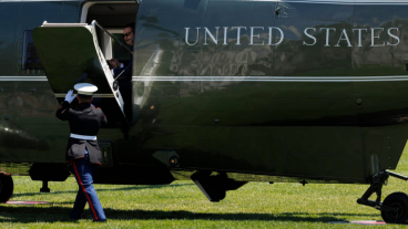  Marine closes the door of Marine One after US President Donald Trump boards to leave the South Lawn of the White House, Washington, DC, USA, 12 May 2026. President Trump is leaving the US to visit China where he will meet with President Xi in Beijing. 