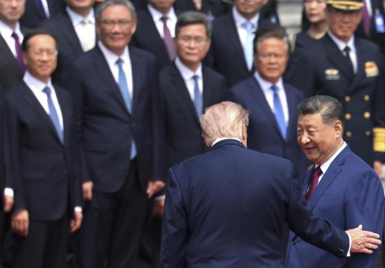  Chinese President Xi Jinping and U.S. President Donald Trump attend a welcome ceremony at the Great Hall of the People in Beijing, China, 14 May 2026. 